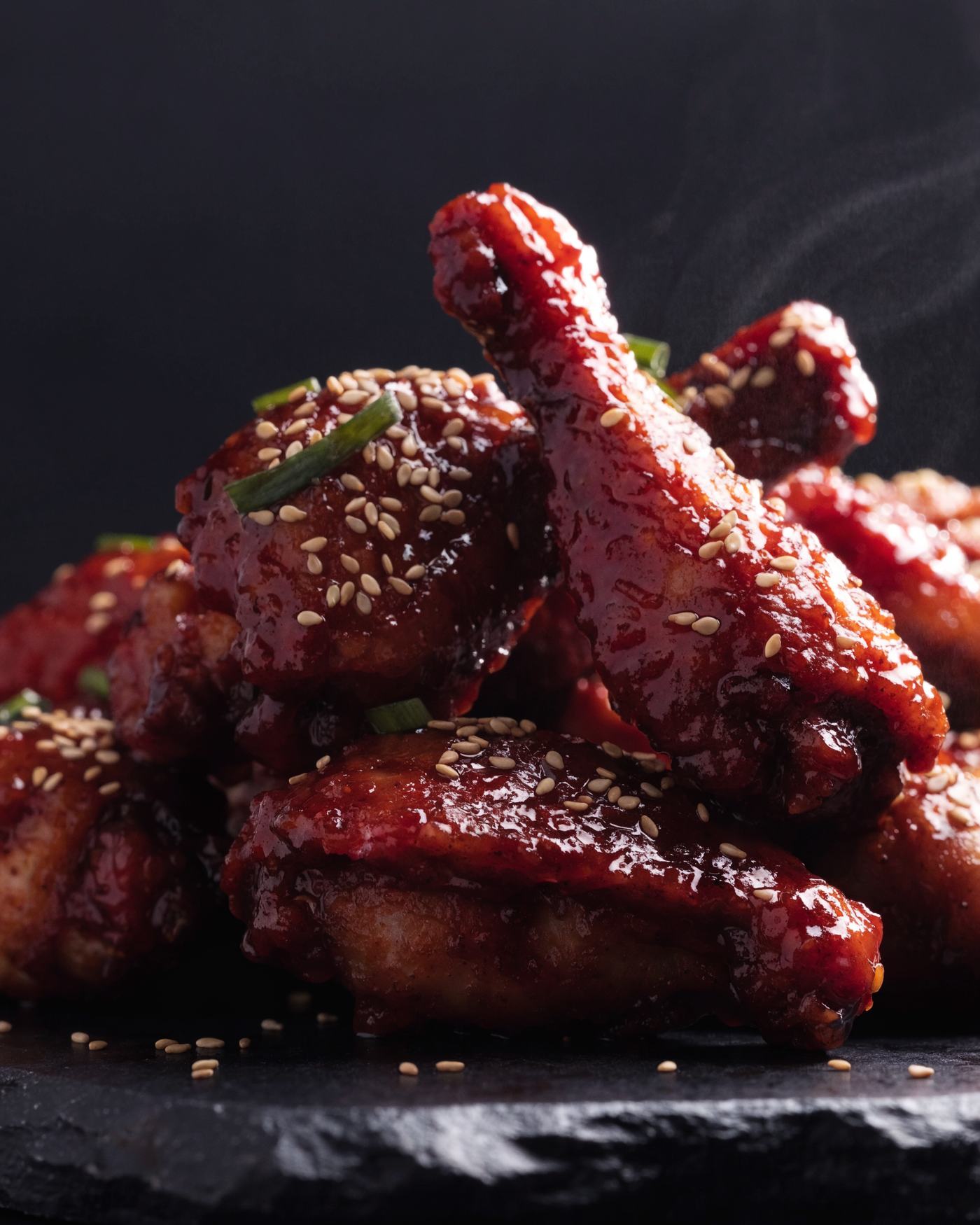 Korean fried chicken glazed in glossy red yangnyeom sauce